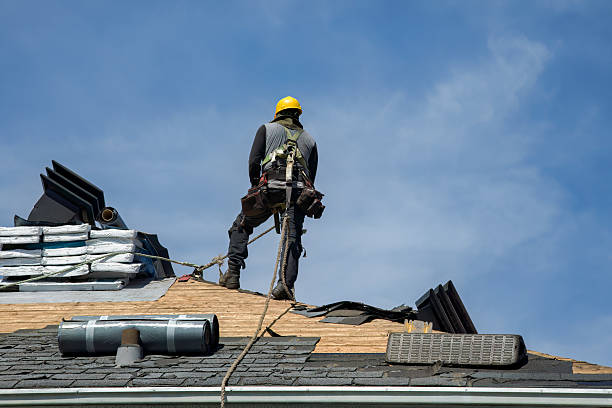 Professional Roofing technician working in Guilford, IN